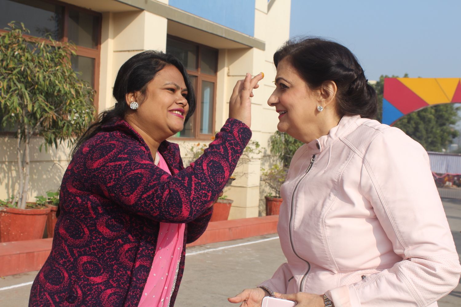 Mrs. Lalita Nijhawan being welcomes by a school faculty