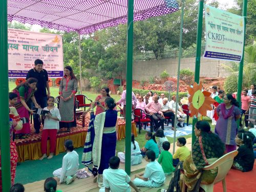 Mrs. Lalita Nijhawan on the stage along with guests