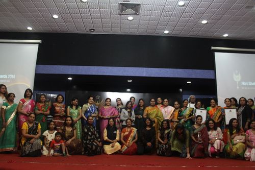 Recipients and guests at an award ceremony