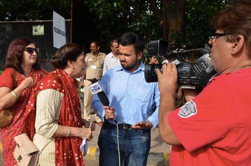 Mrs. Lalita Nijhawan talking to a news reporter