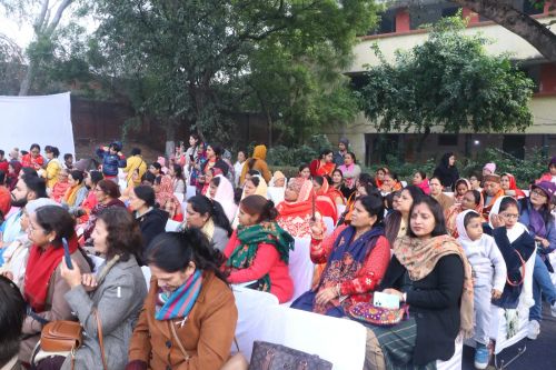 People observing the program