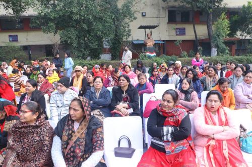 People observing the program