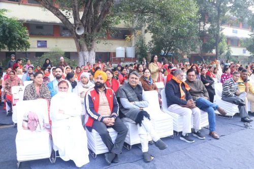 People observing the program