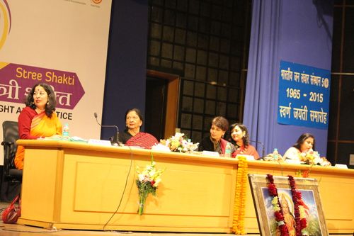 Delegates seated on the stage