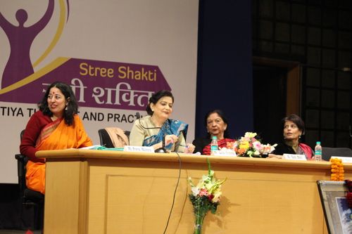 Delegates seated on the stage